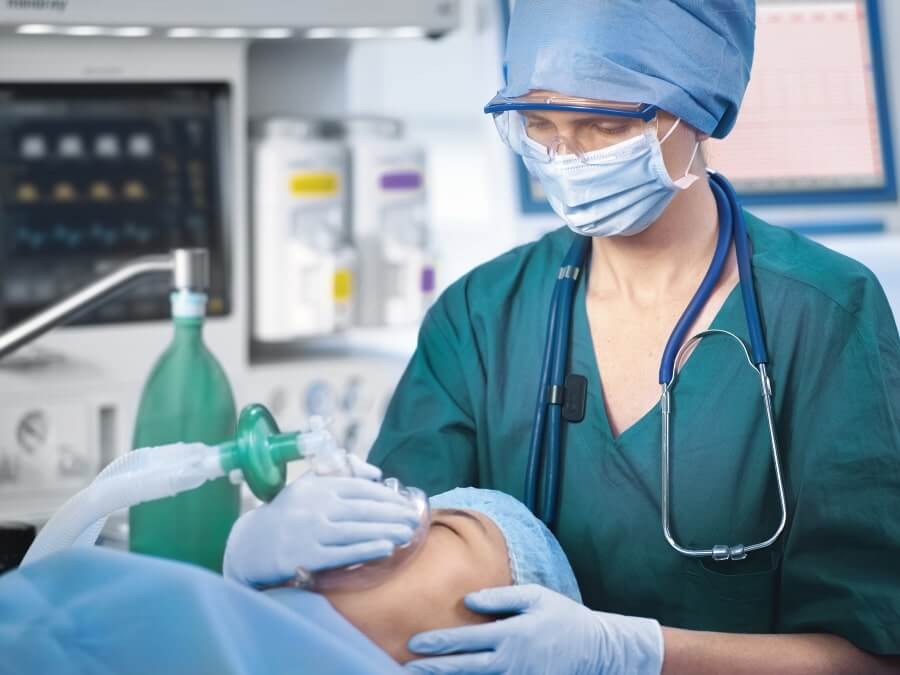 Who administers general anesthesia to a patient?